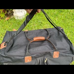 Vintage Heavy Duty Canvas Rolling Duffle Bag with leather trim